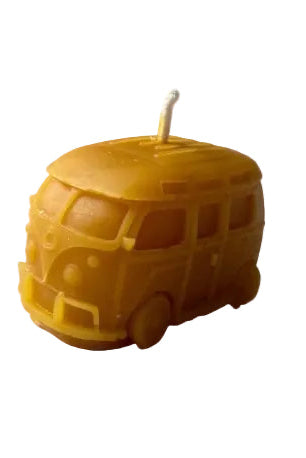 Volkswagen Bus shaped candle made of beeswax on a white background