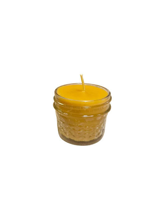 beeswax candle in a glass jar